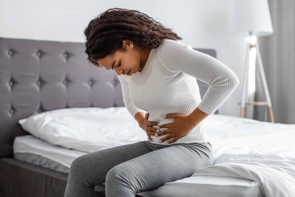 woman with urinary tract infection symptoms